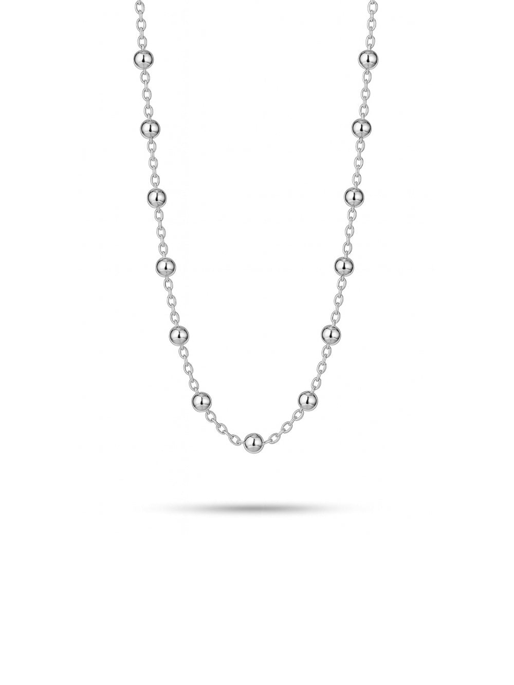 silverhalsband ed små kulor