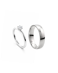 Förlovningsringar i set till dam och herr. silverring och diamantring
