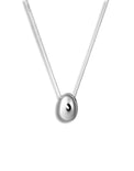 silverhalsband med ett massivt silver ägg till dam.