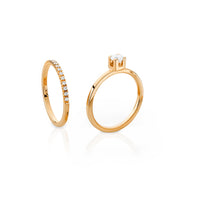 Set med vigselring och förlovningsring i 18k. guld med diamanter. 